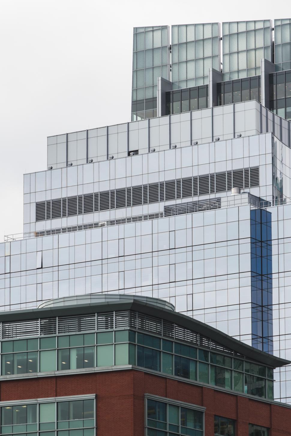 Free Image of Modern architecture showcases sleek glass and steel design 