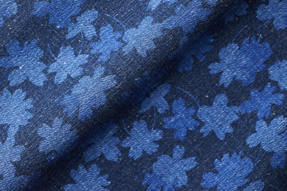 Free Image of Blue floral fabric pattern showcases intricate design and texture for sewing 