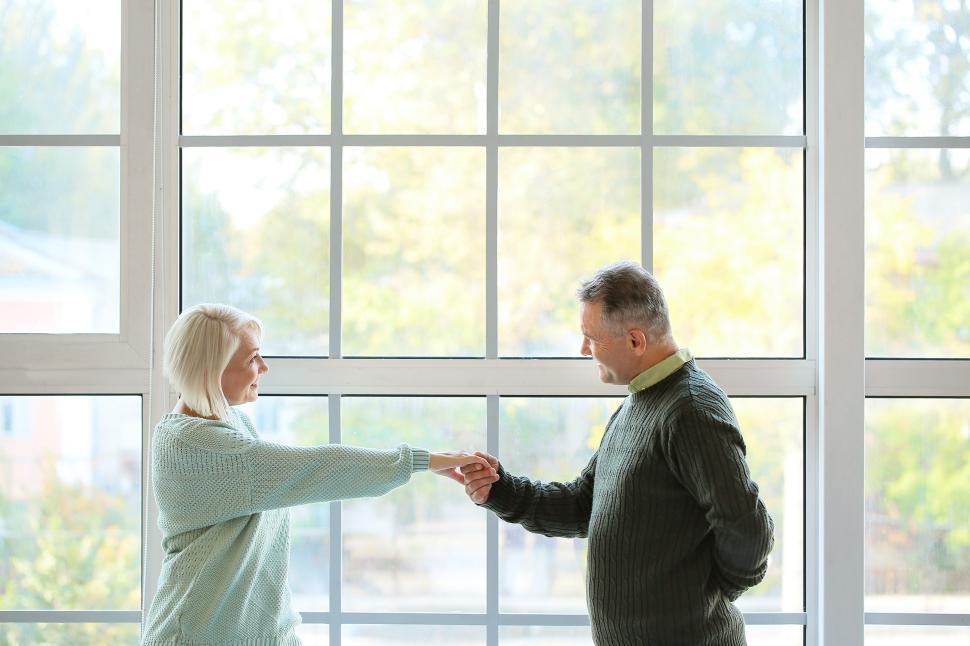 Free Image of Elderly couple sharing a tender moment indoors 