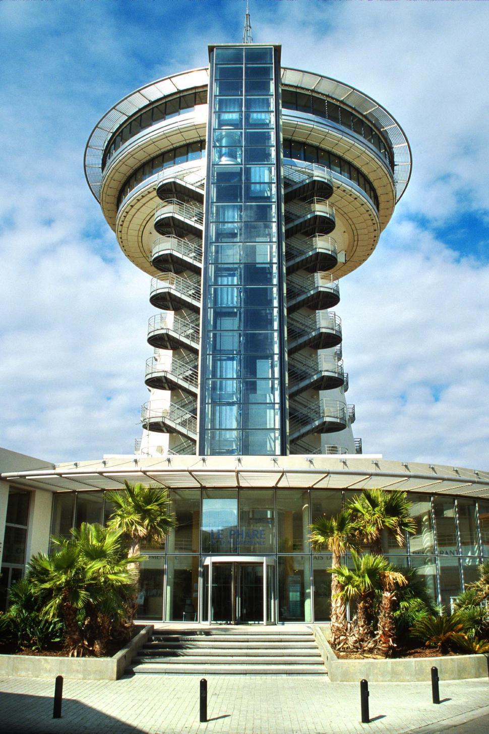 Free Image of Towering Building With Numerous Windows 