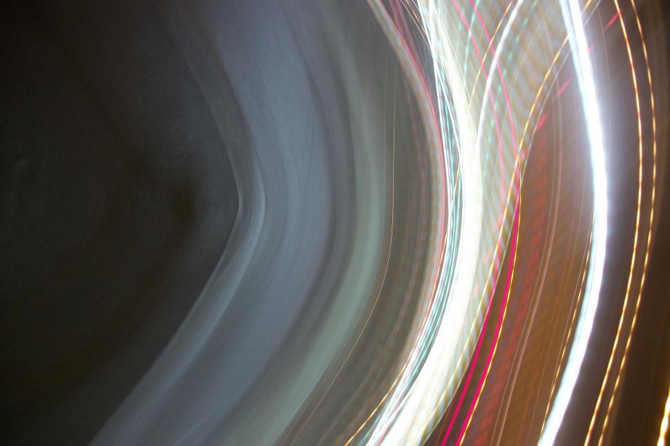 Free Image of Blurry Night Shot of a Street Light 