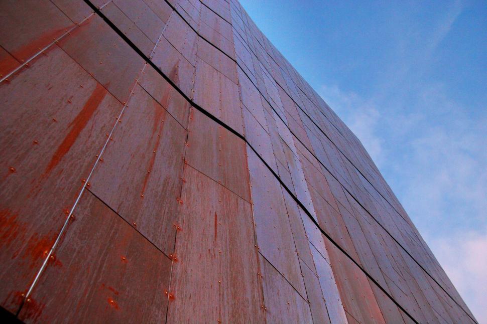 Free Image of Looking up at a copper wall 