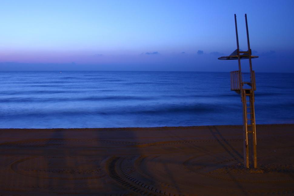Free Image of A View of a Body of Water From a Beach 
