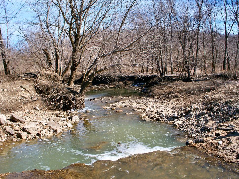 Free Image of Small waterfall in a rocky creek 