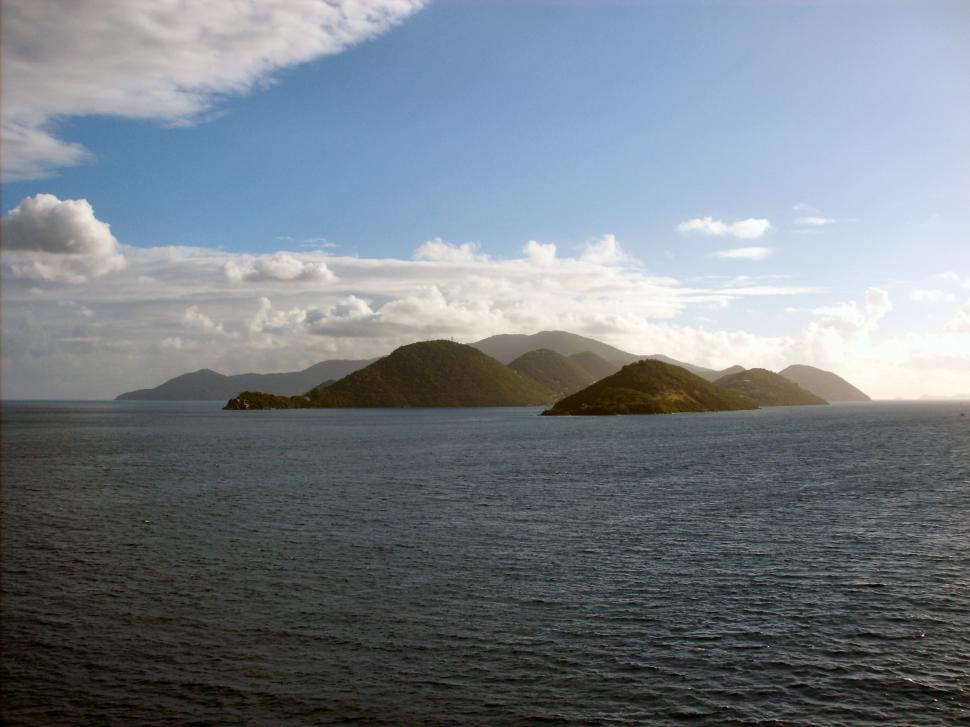 Free Image of Underwater mountain tops coming through the water in South America 