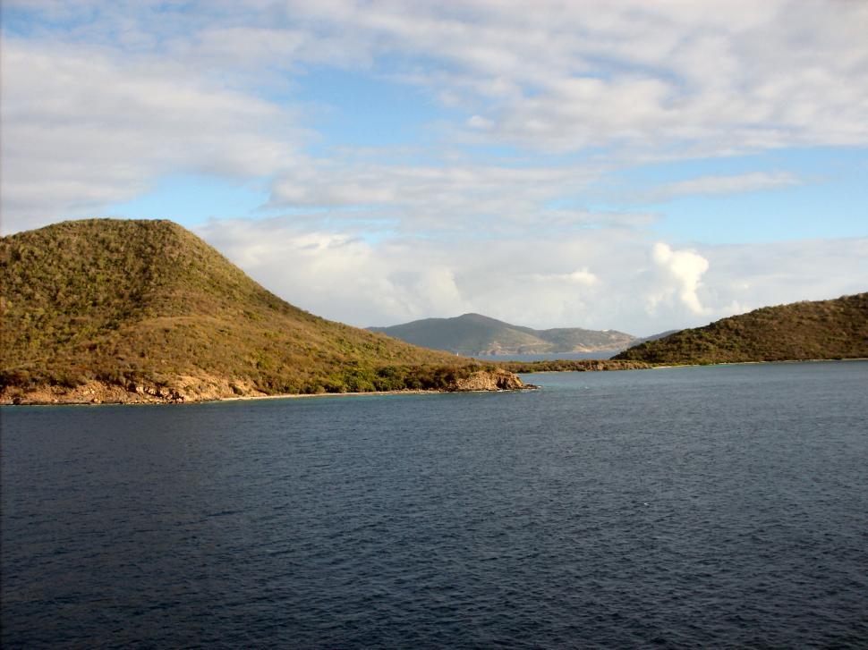 Free Image of Underwater mountain tops coming through the water in South America 