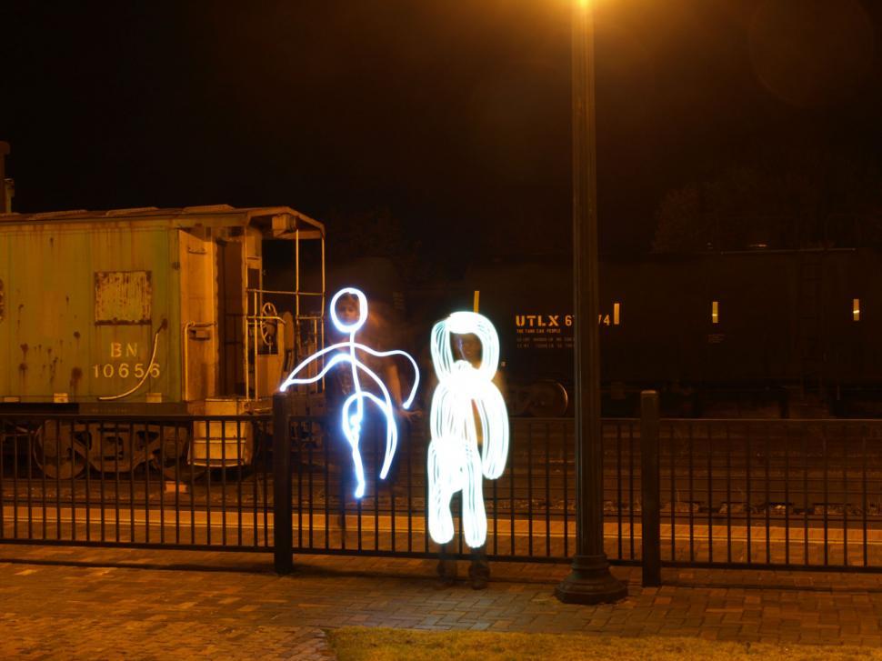 Free Image of Stick Figures painting with light photography 