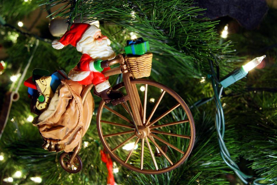Free Image of Christmas Ornament Hanging From Christmas Tree 