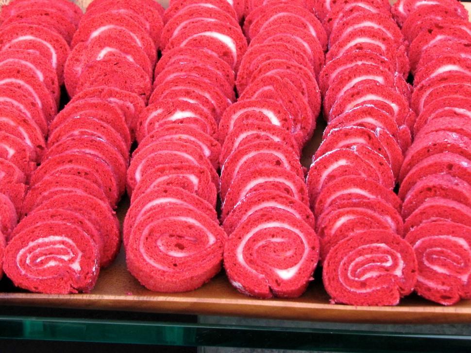 Free Image of Pile of Red Rolls on Table 