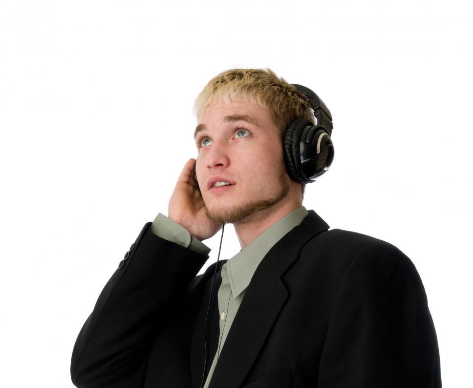 Free Image of Young man looks up 