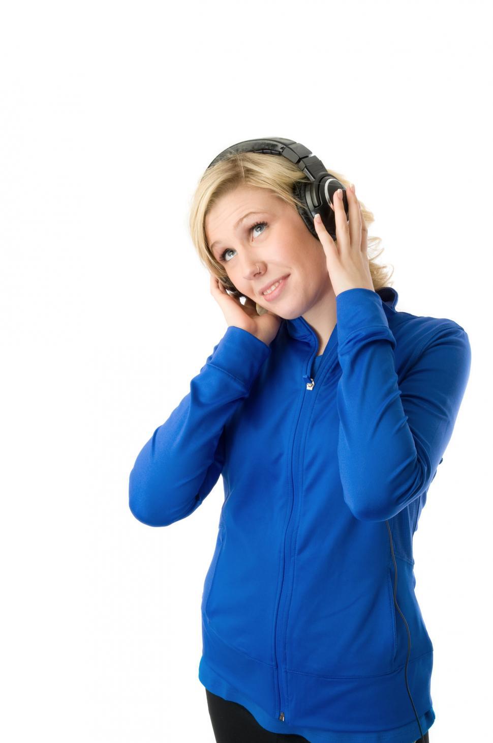 Free Image of Young woman listens 