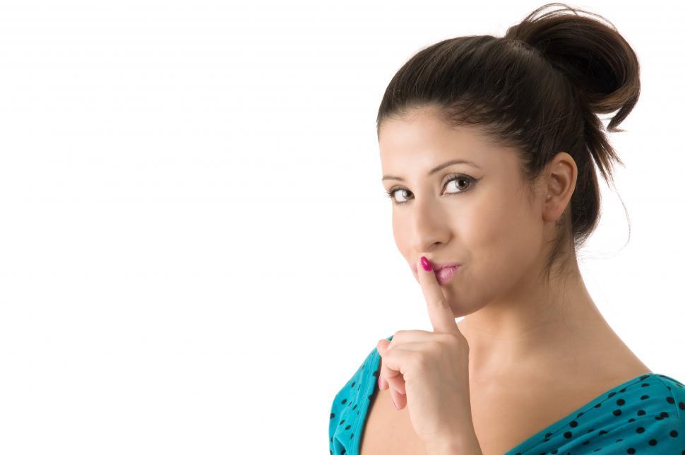 Free Image of Young woman shushing 