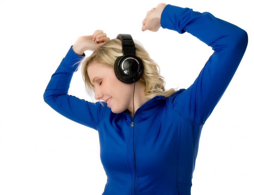 Free Image of Young woman dancing in headphones 