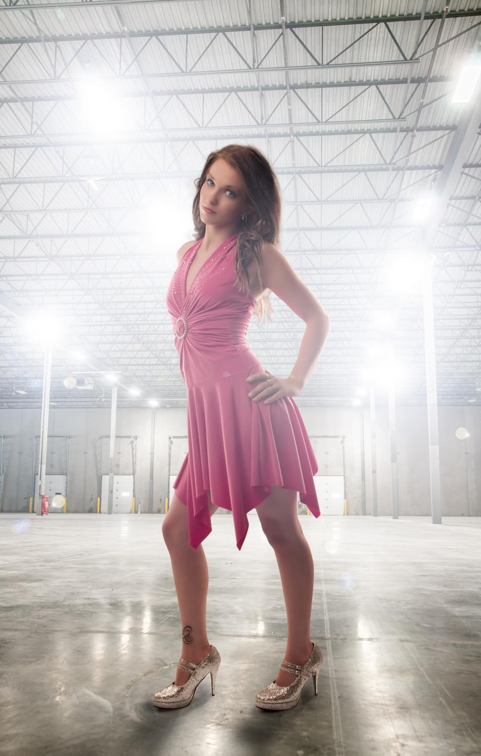 Free Image of Model in empty warehouse 