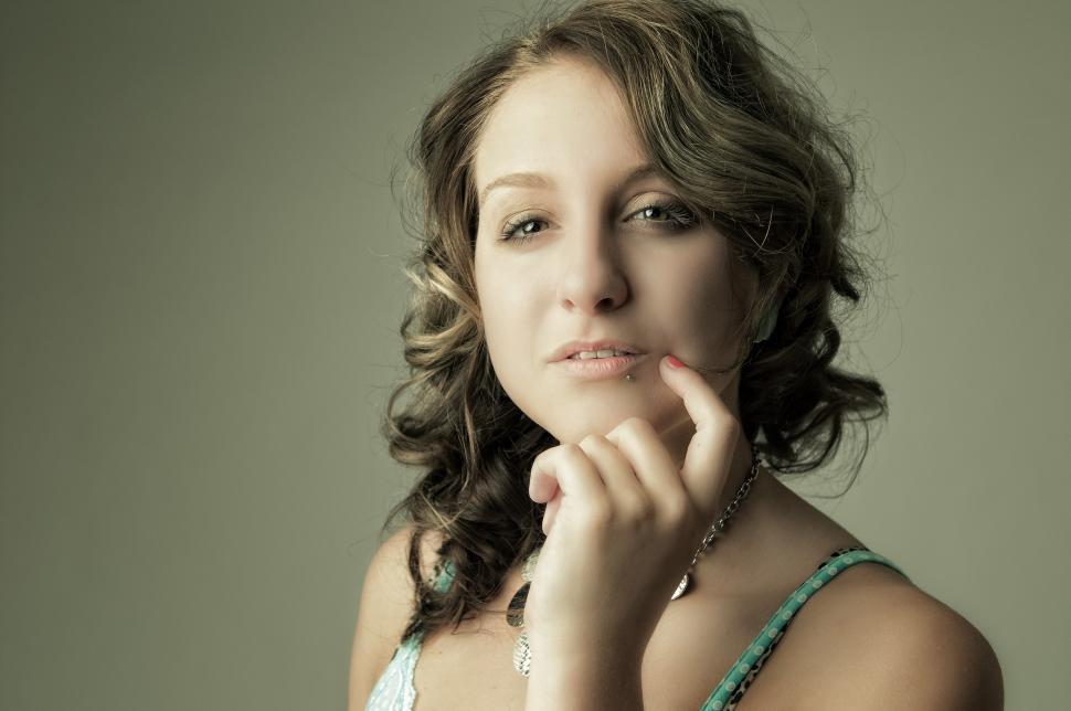 Free Image of Thoughtful woman looking at camera 