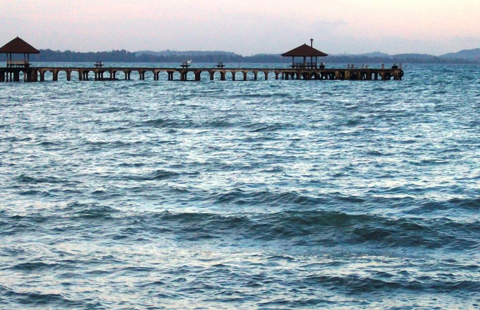 Free Image of Long Wooden Tropical Pier at sunset 