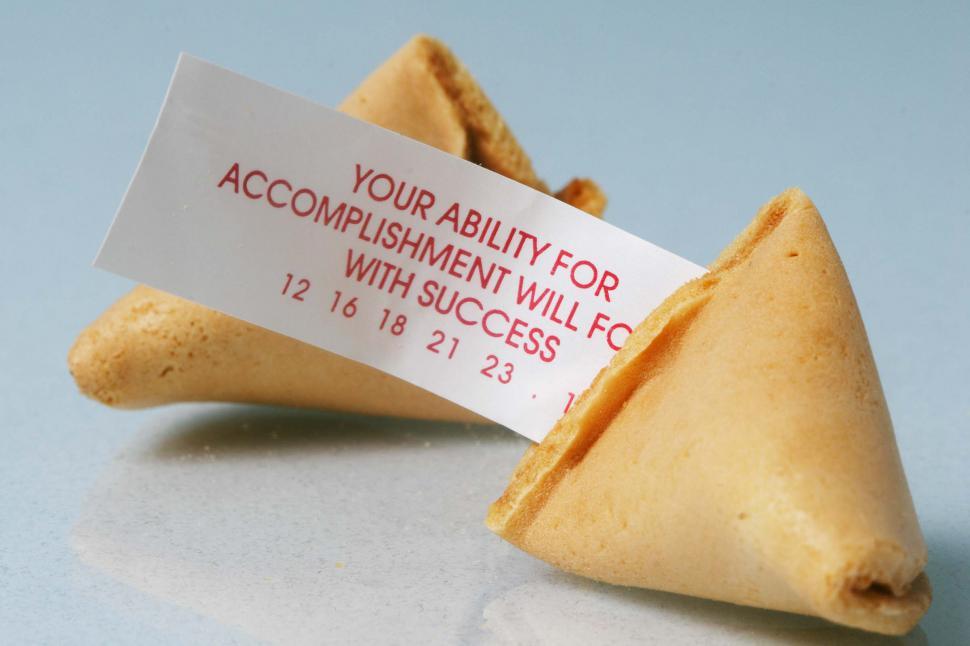Free Image of Open fortune cookie with fotune 