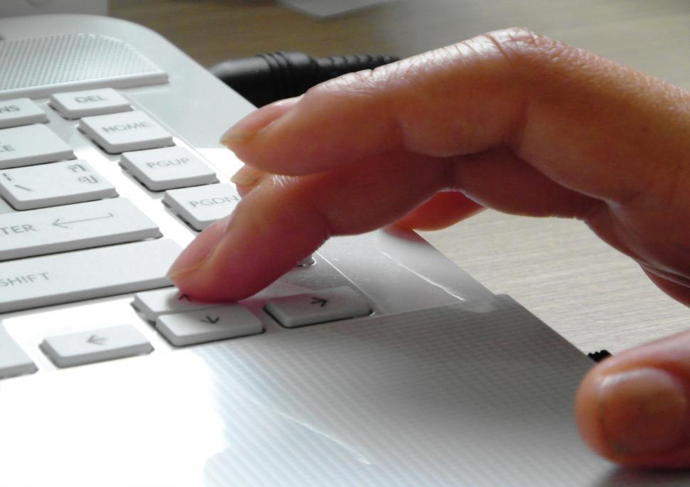 Free Image of Pressing keys on a keyboard 
