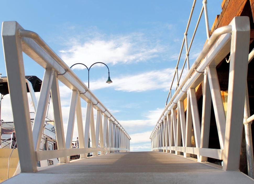 Free Image of A boardwalk at a marina 