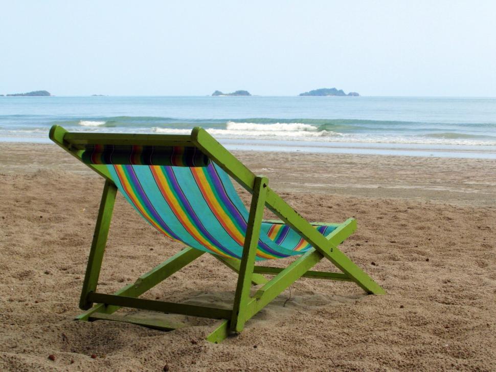 Free Image of Deckchair on an Empty Beach  