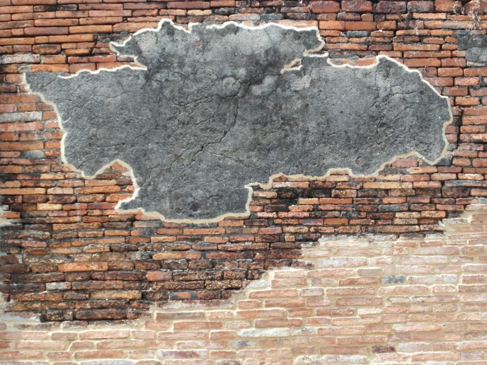 Free Image of Brick Wall with Blank Concrete Patch 