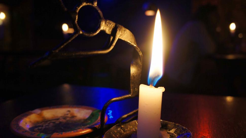 Free Image of Music Man By Candle 