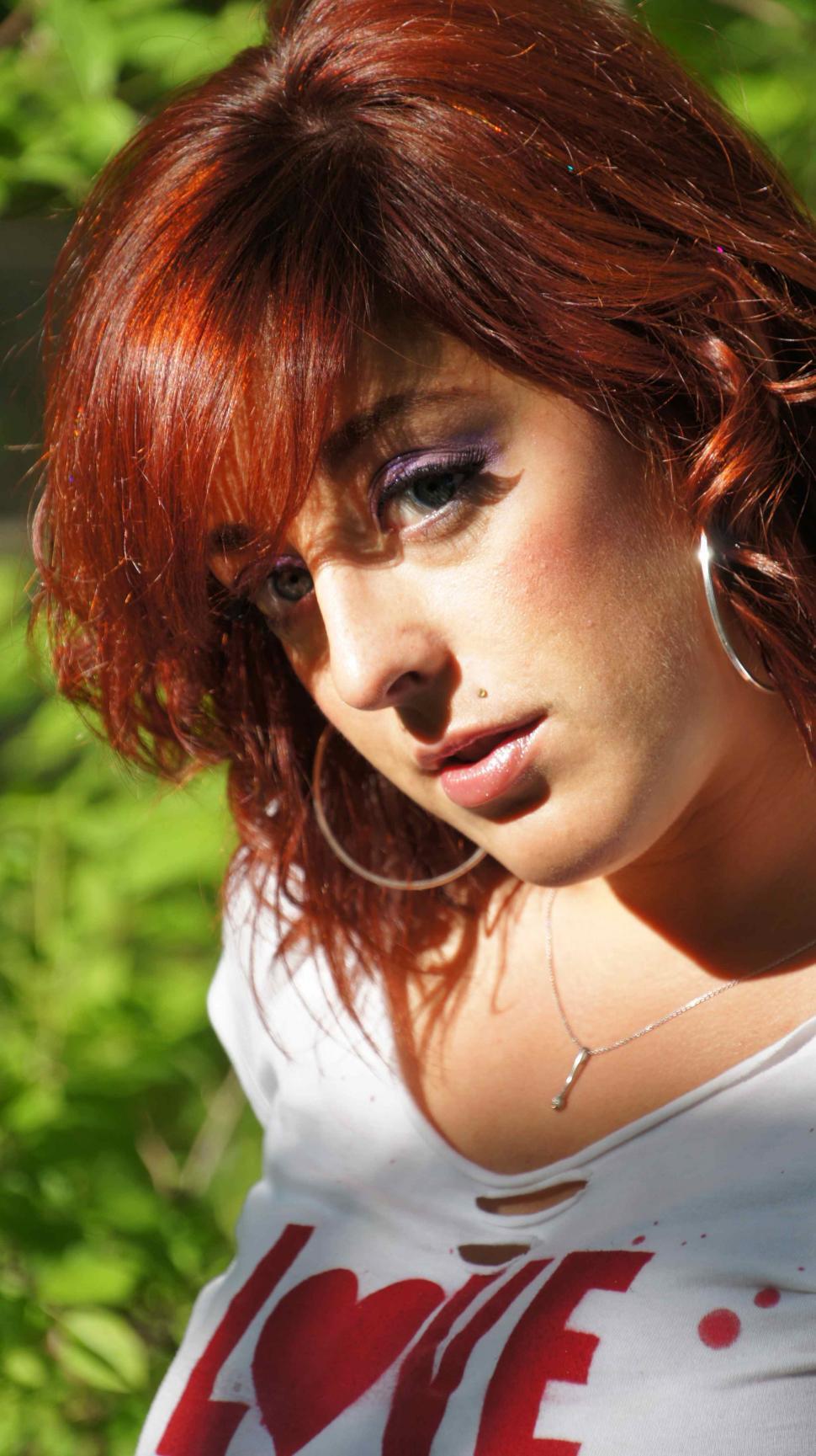 Free Image of Woman with Tattoos in Woods 