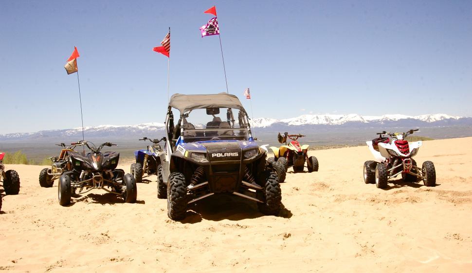 Free Image of ATVs await Fun at the Sand Dunes 