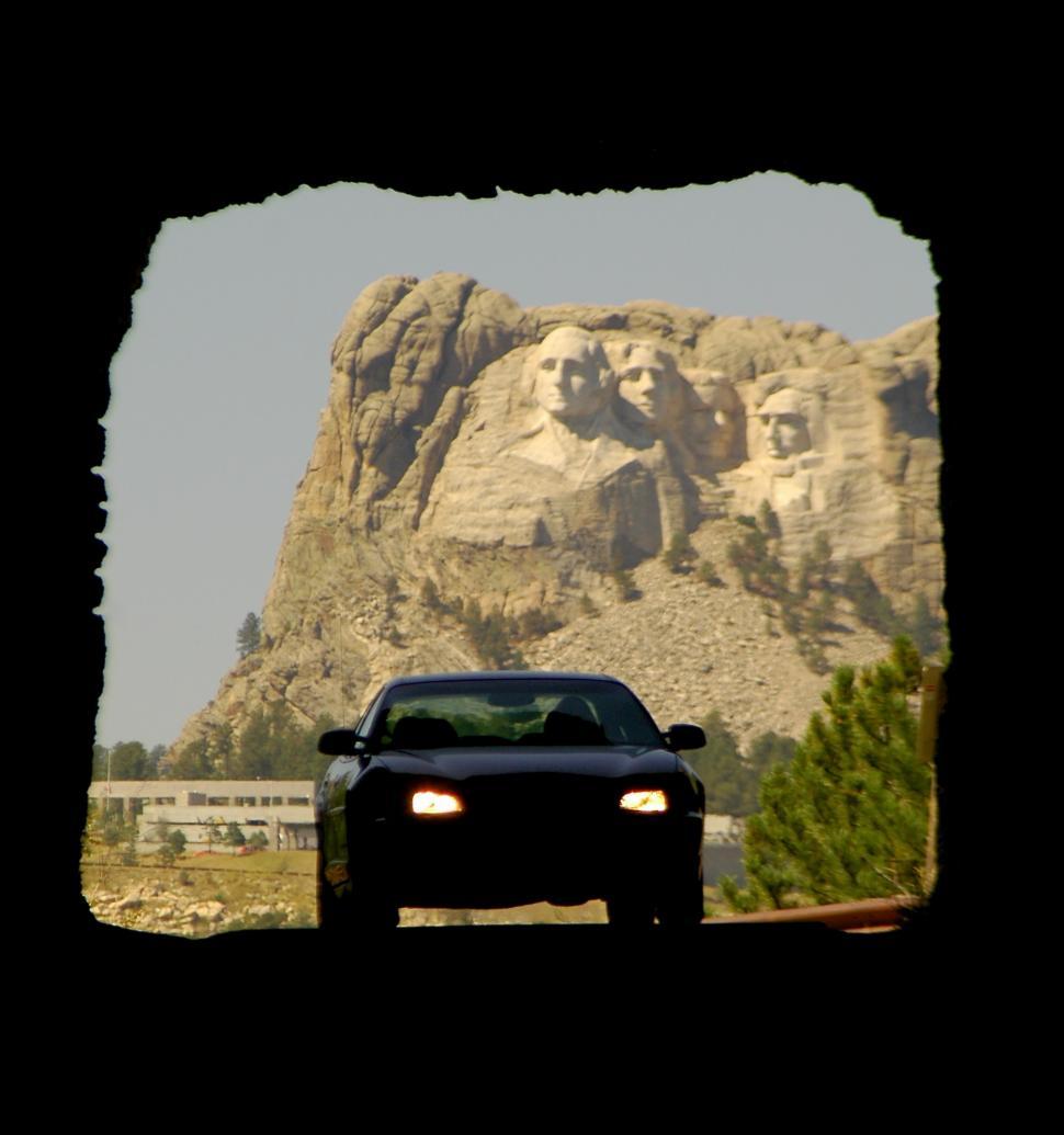 Free Image of Car drives tunnel with Mount Rushmore 