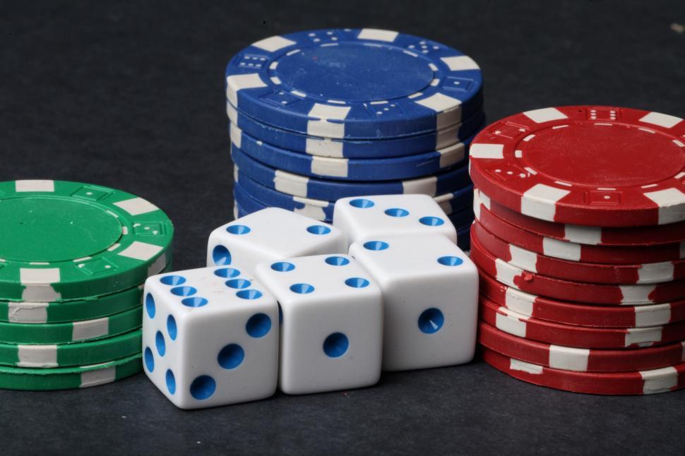 Free Image of Dice and Poker chips on black 