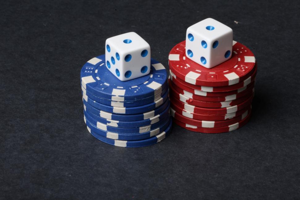 Free Image of Dice and Poker chips on black 