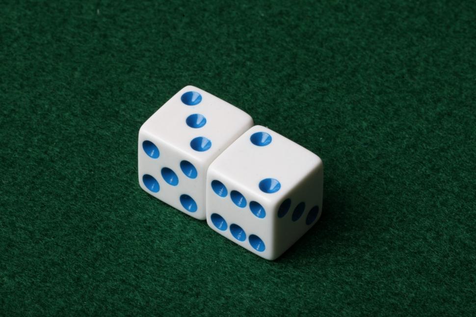Free Image of Two dice on green felt 