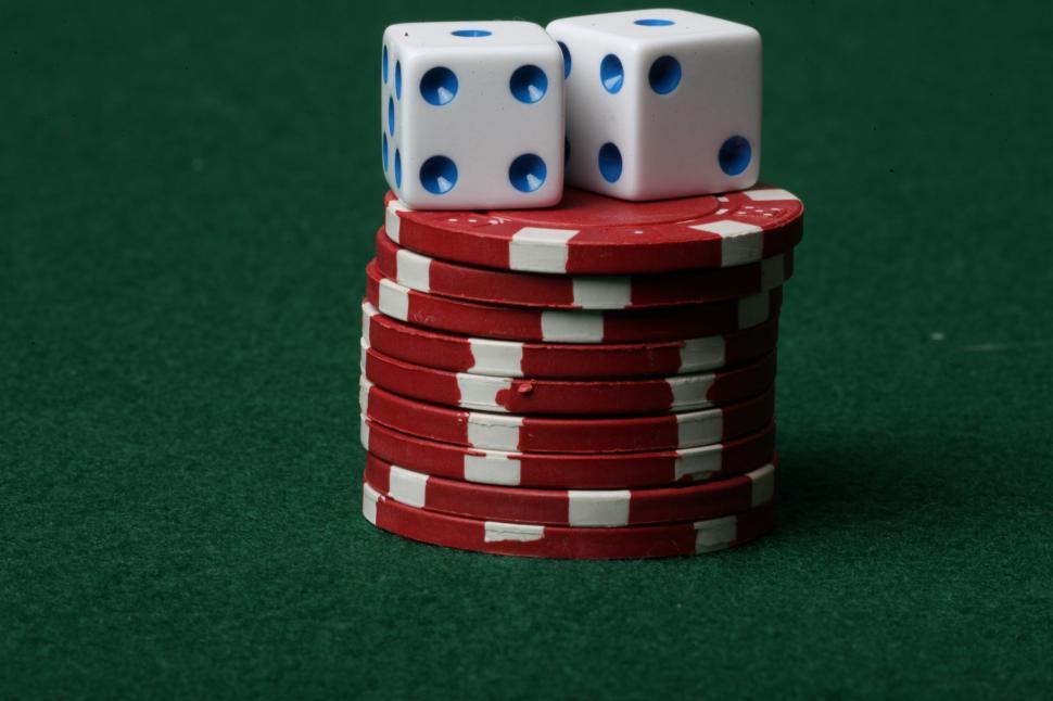 Free Image of Two dice on red poker chips 