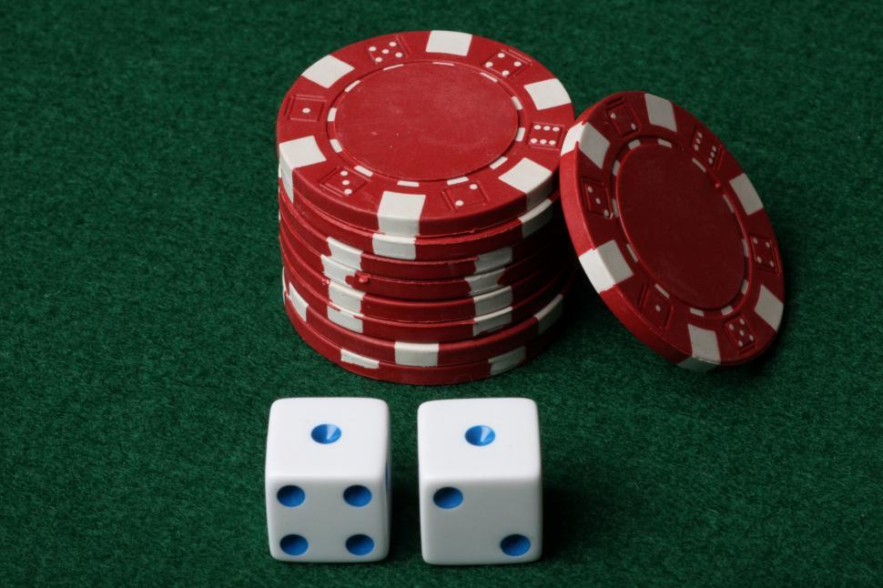 Free Image of Two dice on red poker chips 