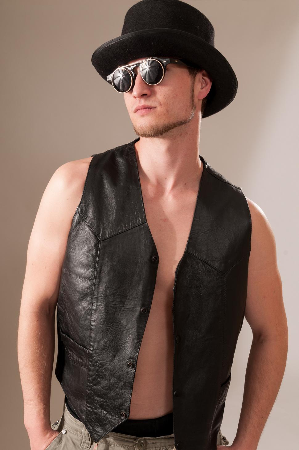 Free Image of Cool guy in a vest and top hat 