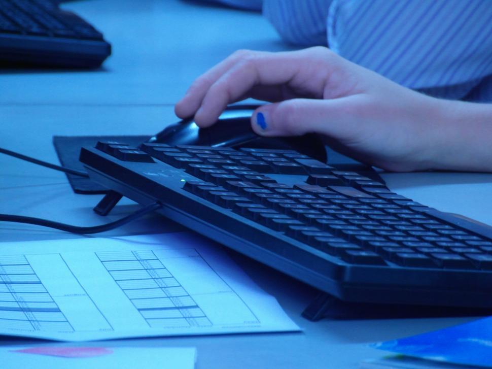 Free Image of Hand on Computer Mouse 