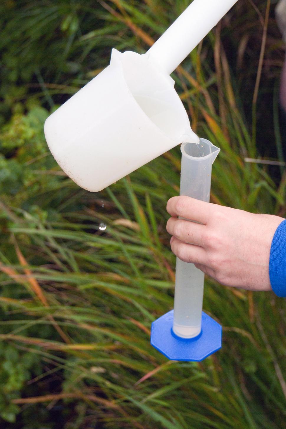 Free Image of Man with Sampling Containers 