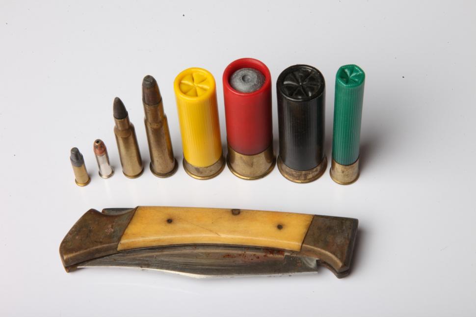 Free Image of Various bullets and knife 