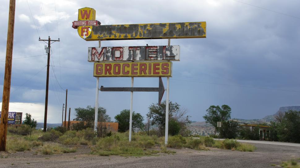 Free Image of Abandoned White Sign 