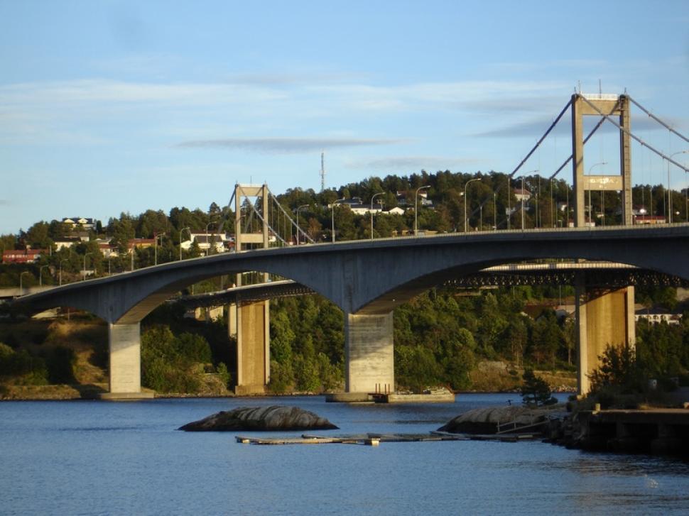 Free Image of Large Bridge Spanning Across Vast Body of Water 