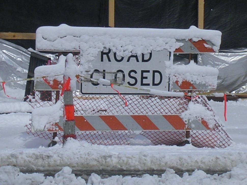 Free Image of Snow covered road closed sign 