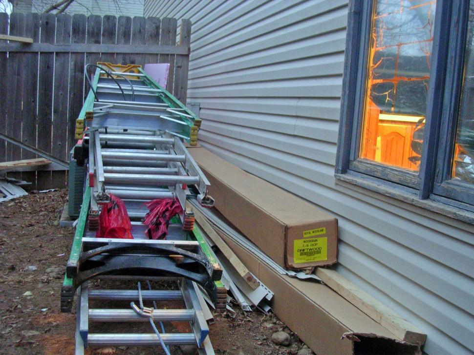 Free Image of Ladders for siding work 