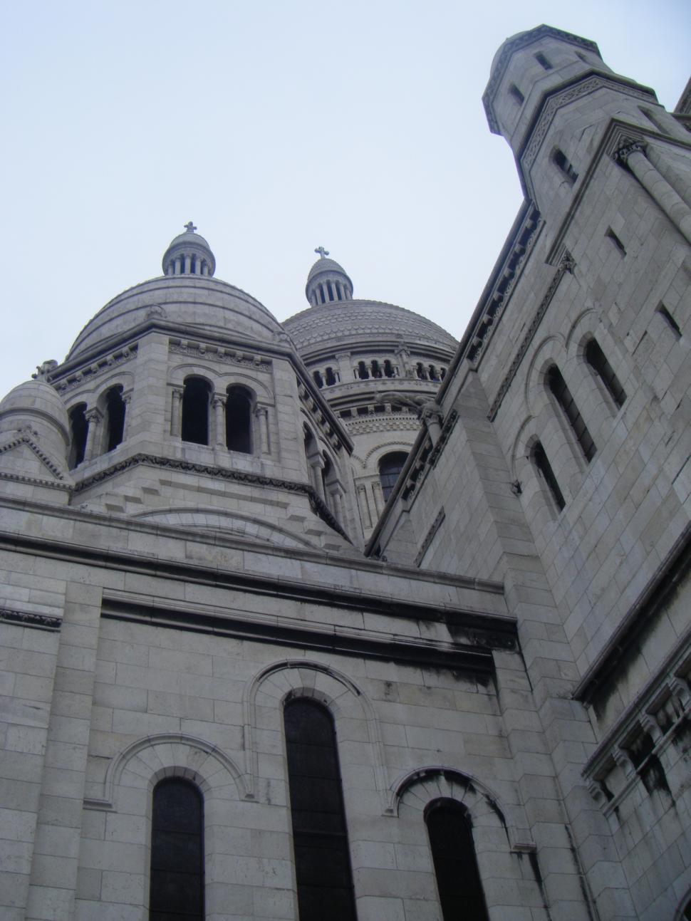 Free Image of Tall Building Featuring Clock on Side 