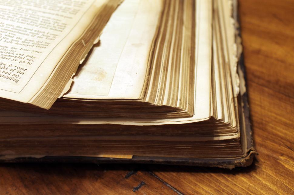 Free Image of Stack of Books on Wooden Table 