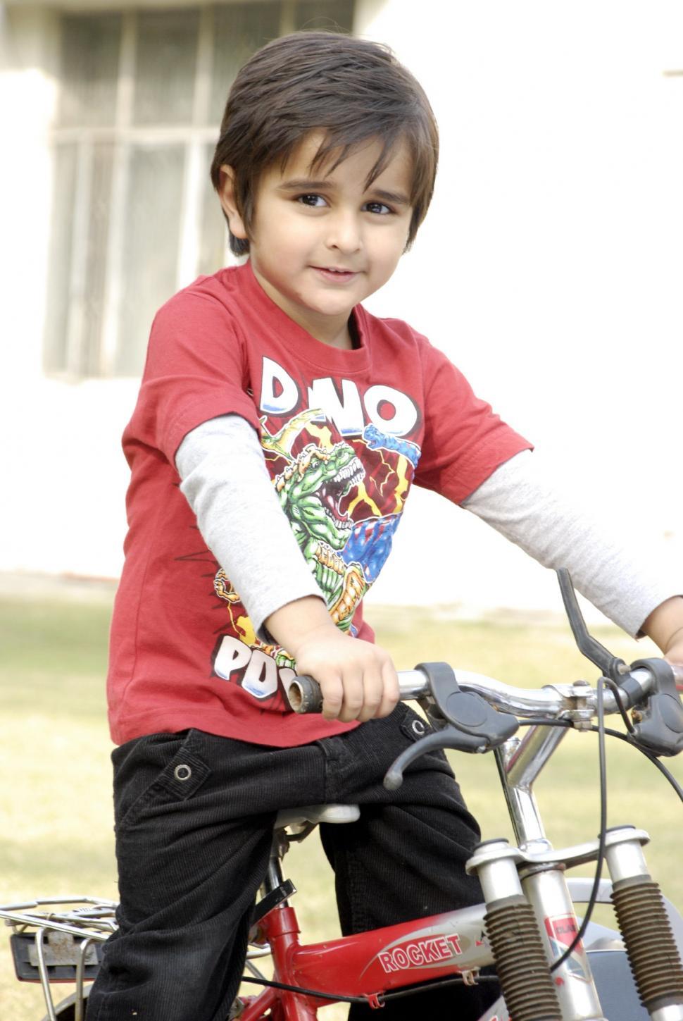 Free Image of Cute Kid with Bicycle 