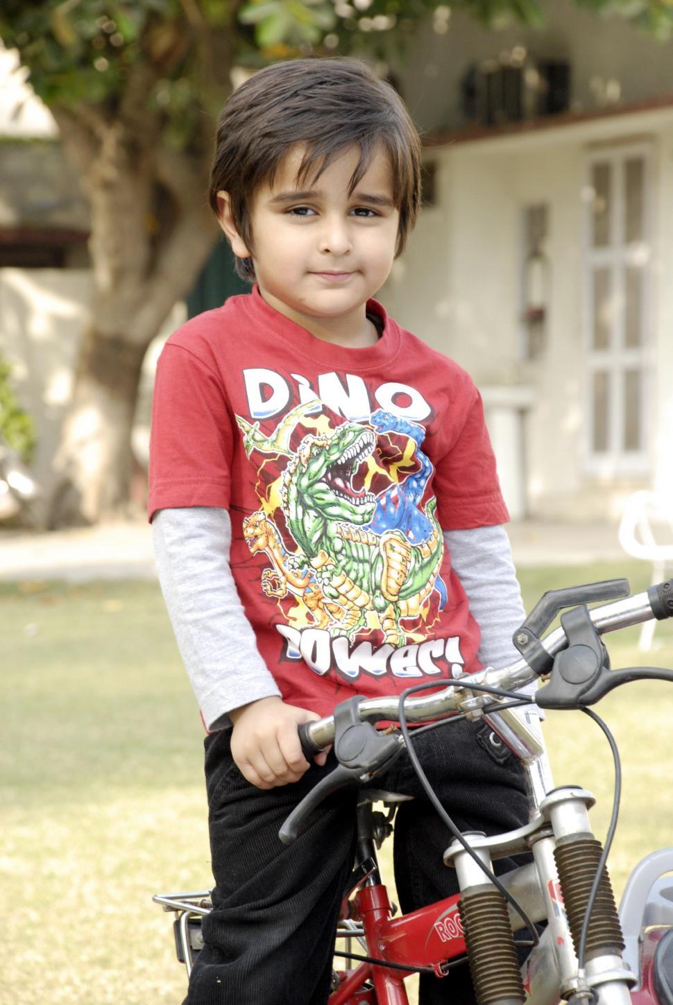 Free Image of Cute Child with Bicycle 