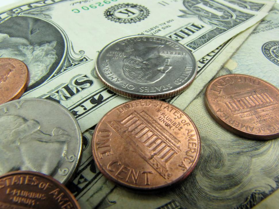 Free Image of Close-up of US dollars and coins 