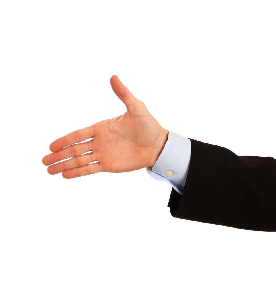 Free Image of A hand being held out for a handshake 