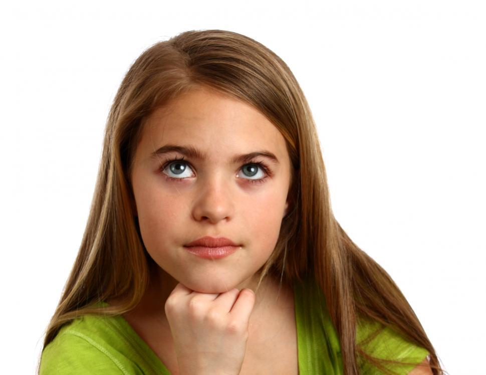Free Image of A beautiful young girl with a thoughtful expression 