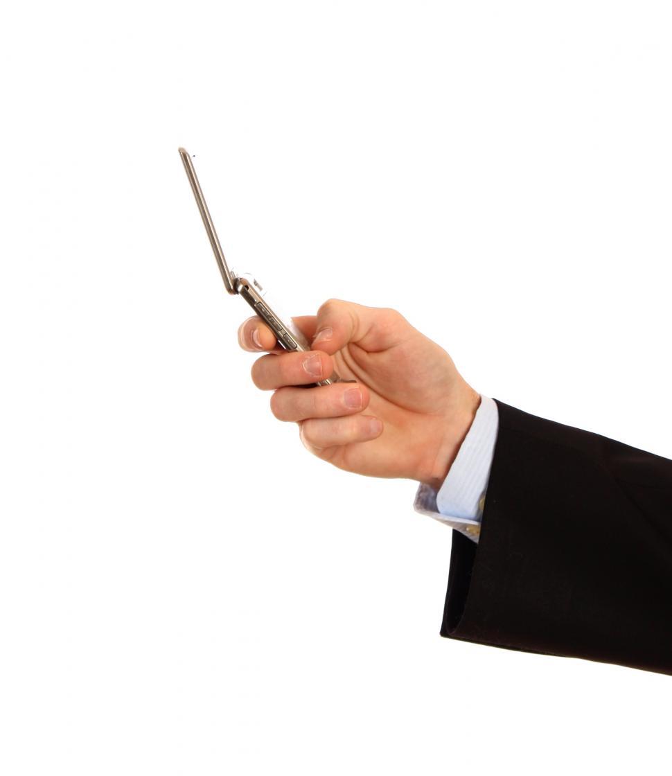 Free Image of A hand holding a cell phone 